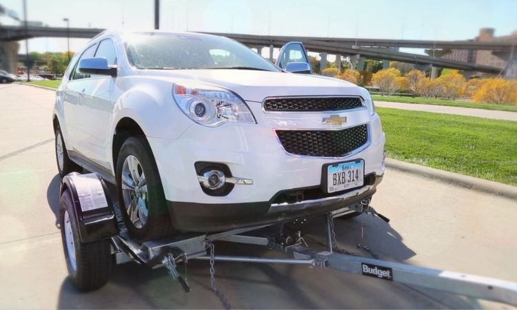 Tow Dolly Pulling a Car